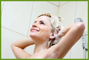 Lady shampooing hair
