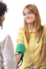 lady having blood pressure checked